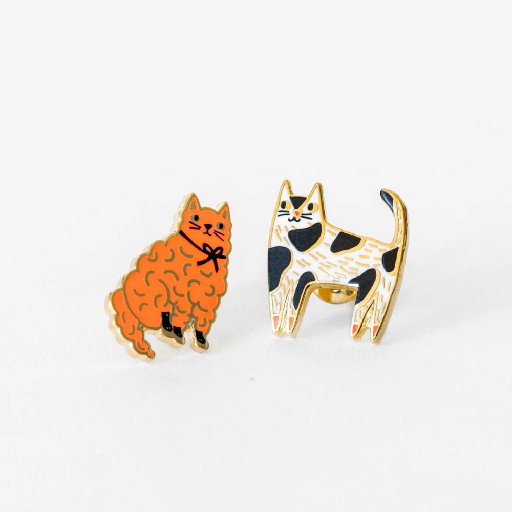 mis-matched gold earrings cats